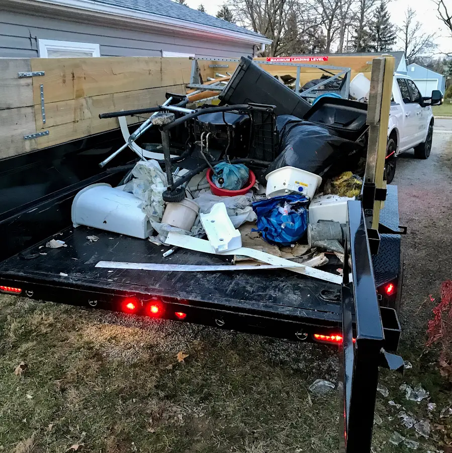 Roll-off dumpster delivered to a residential driveway in Lockport